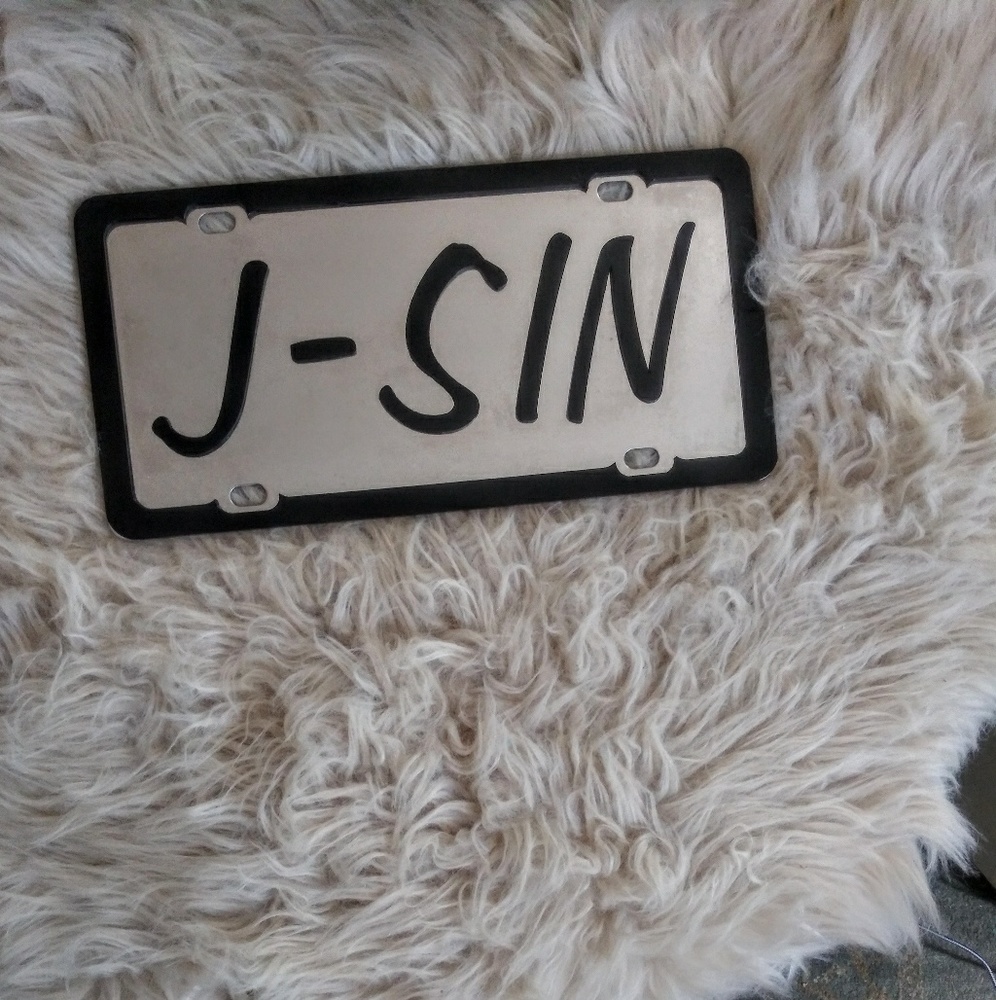 Vanity license plate for front of car: "J-SIN"